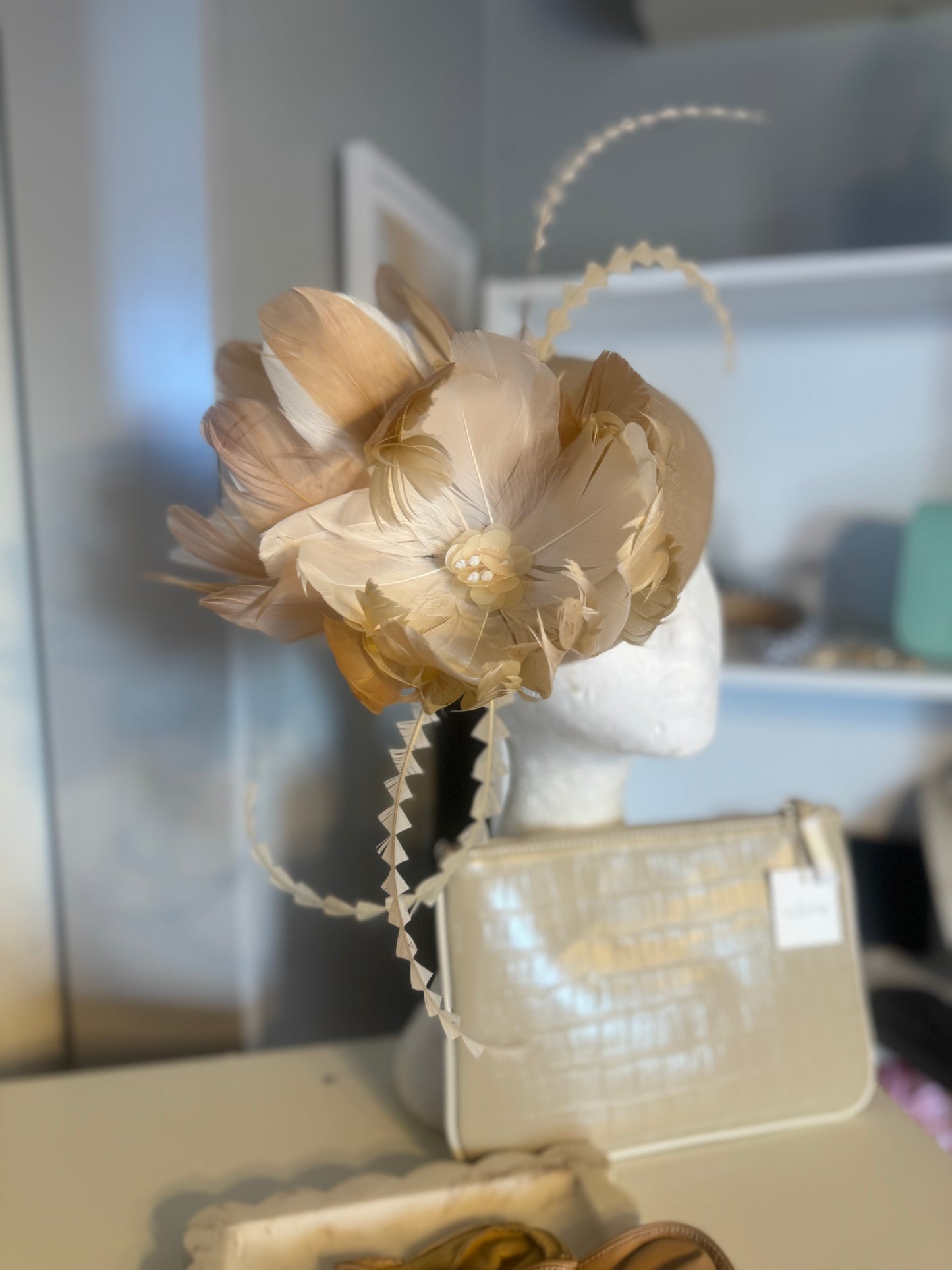 “Clara” nude cream feather felt/wool button