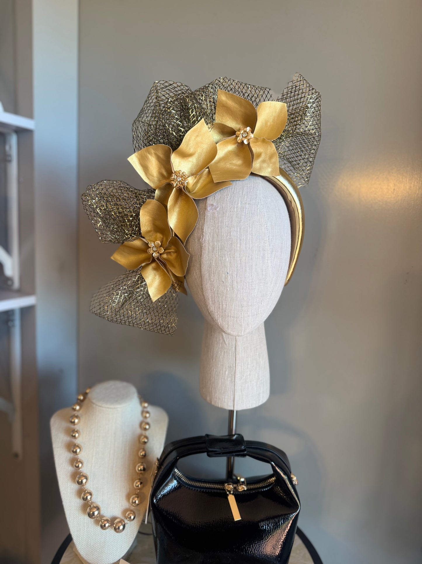 “Louise” gold pleather statement