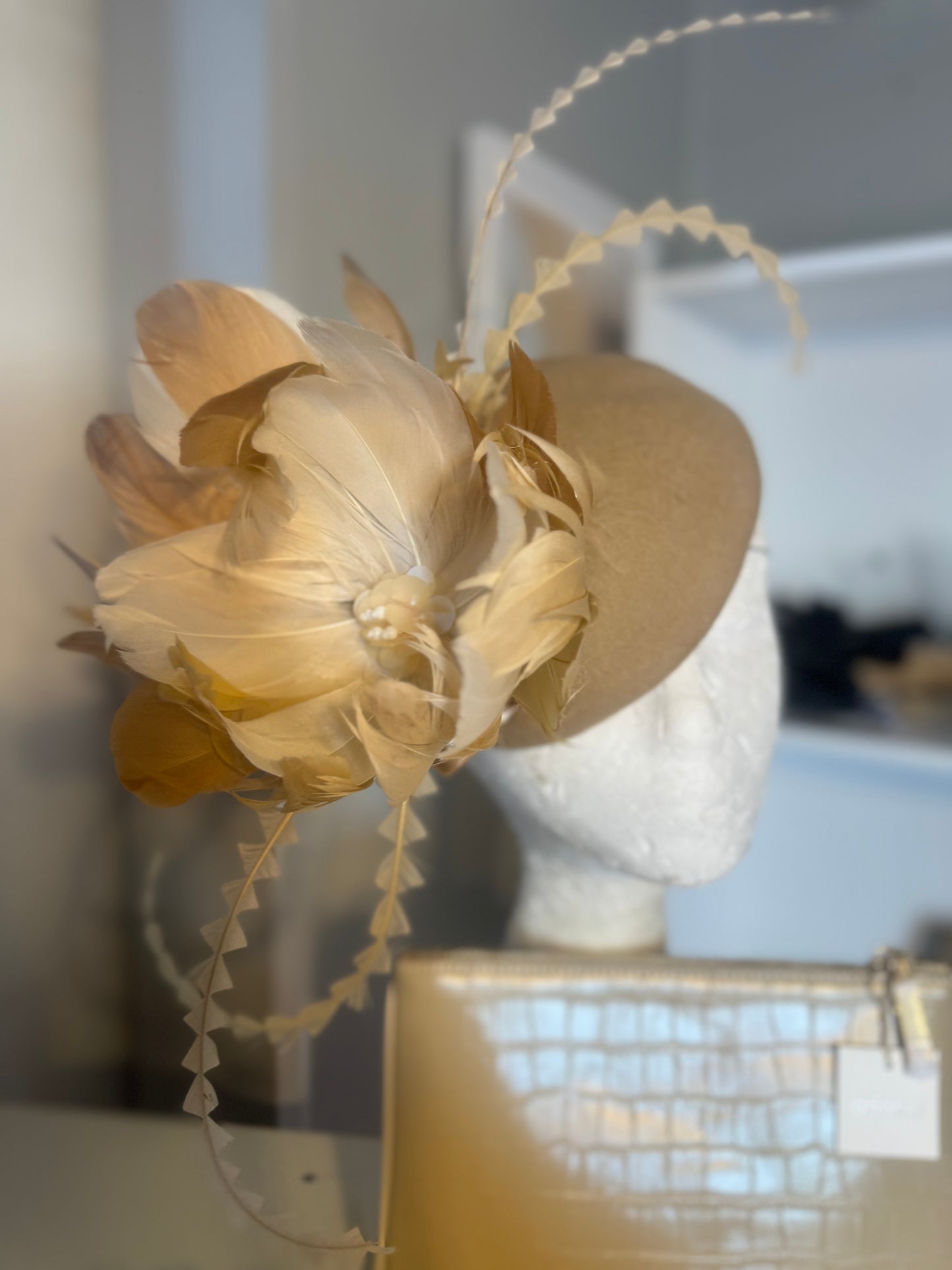 “Clara” nude cream feather felt/wool button