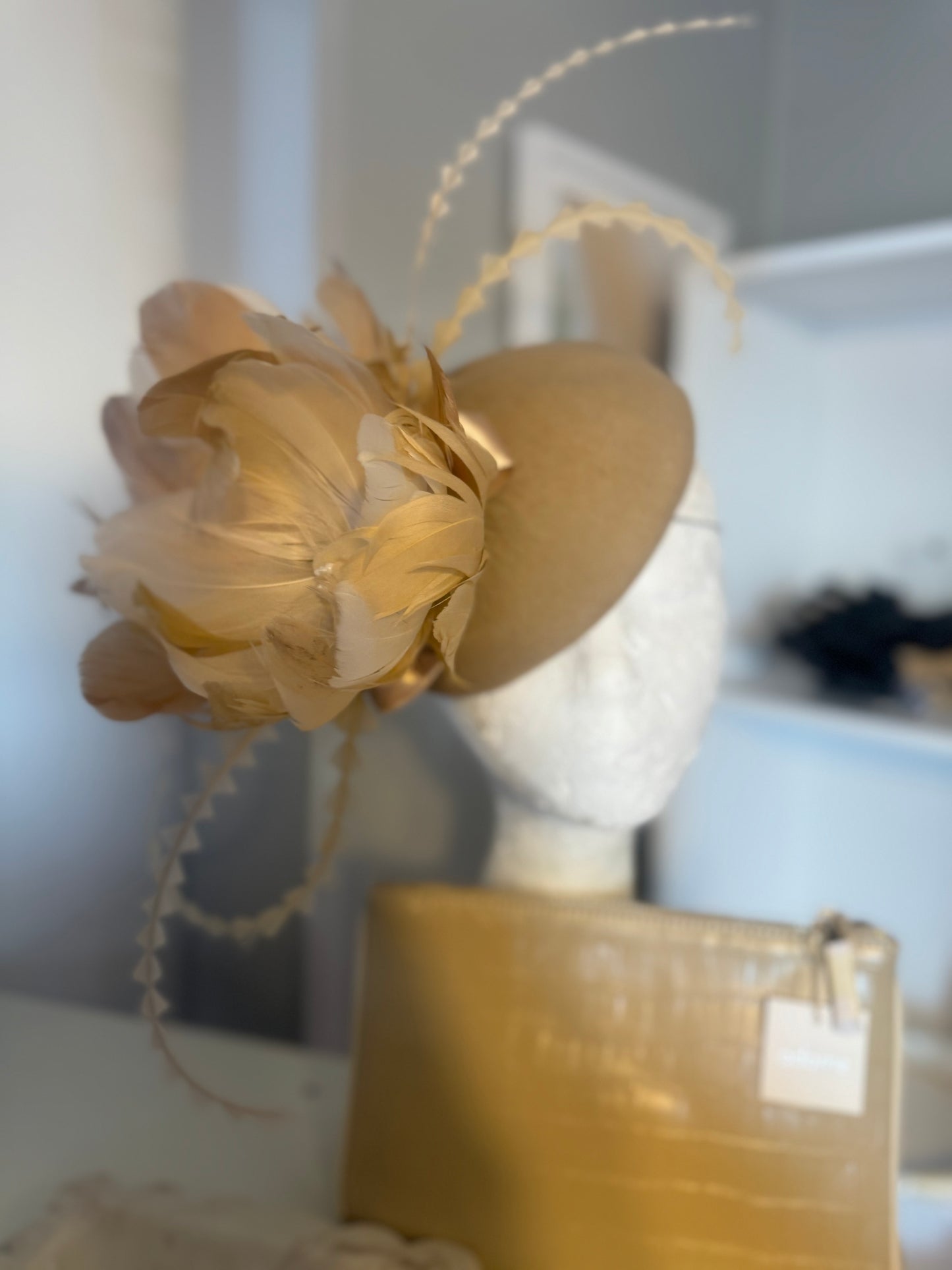 “Clara” nude cream feather felt/wool button