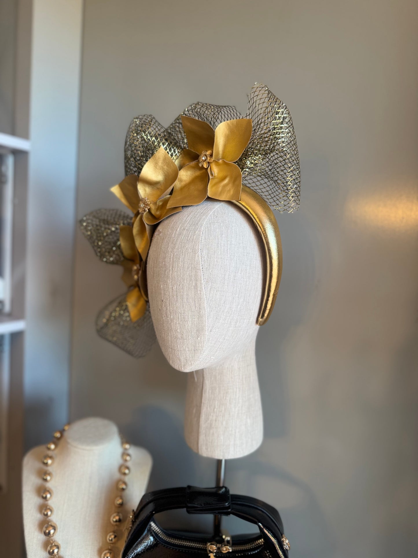 “Louise” gold pleather statement