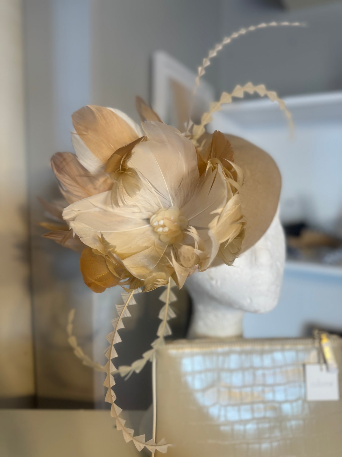 “Clara” nude cream feather felt/wool button