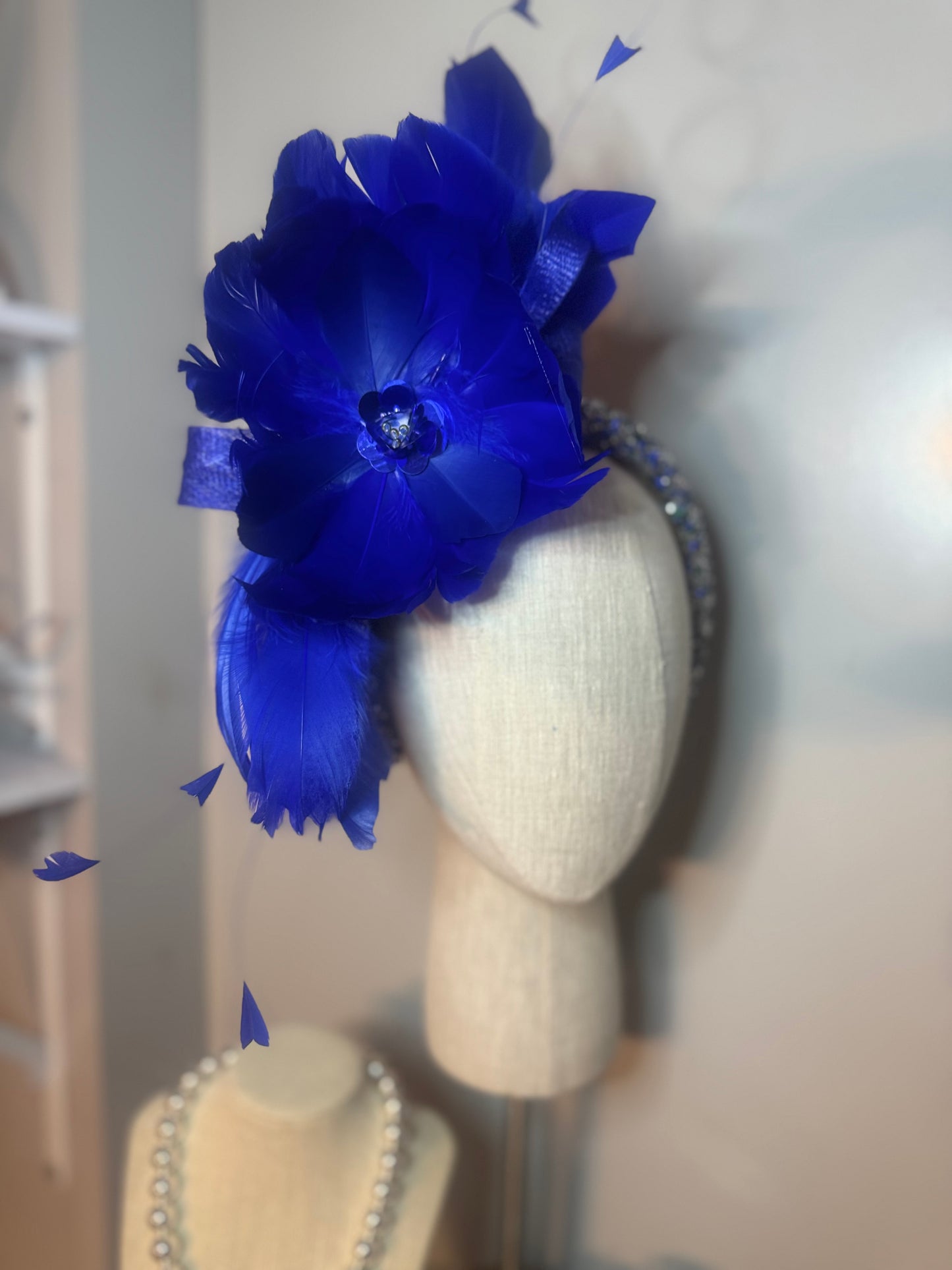 “Meena” cobalt feather statement