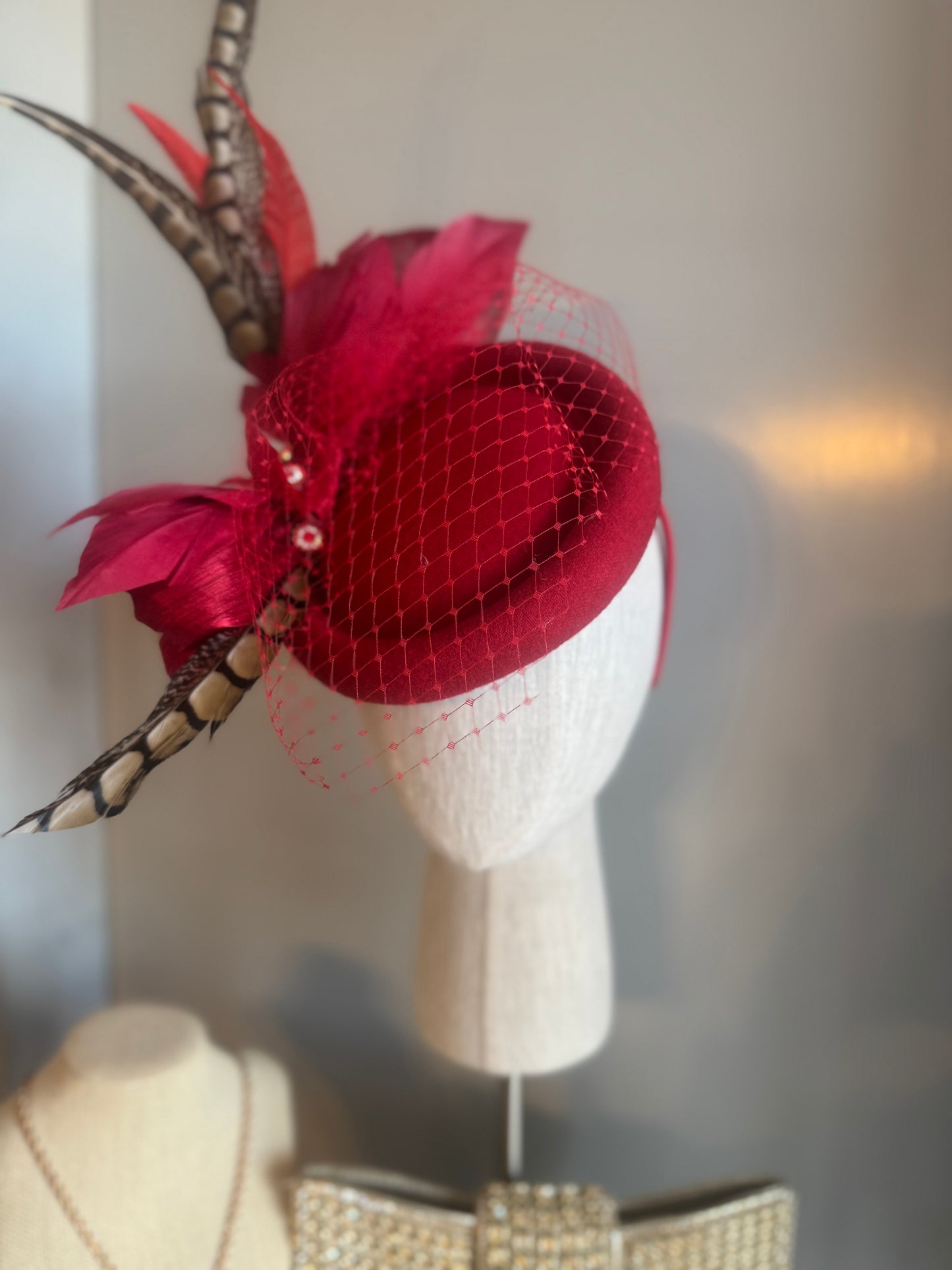 “Jaclyn” red feather statement