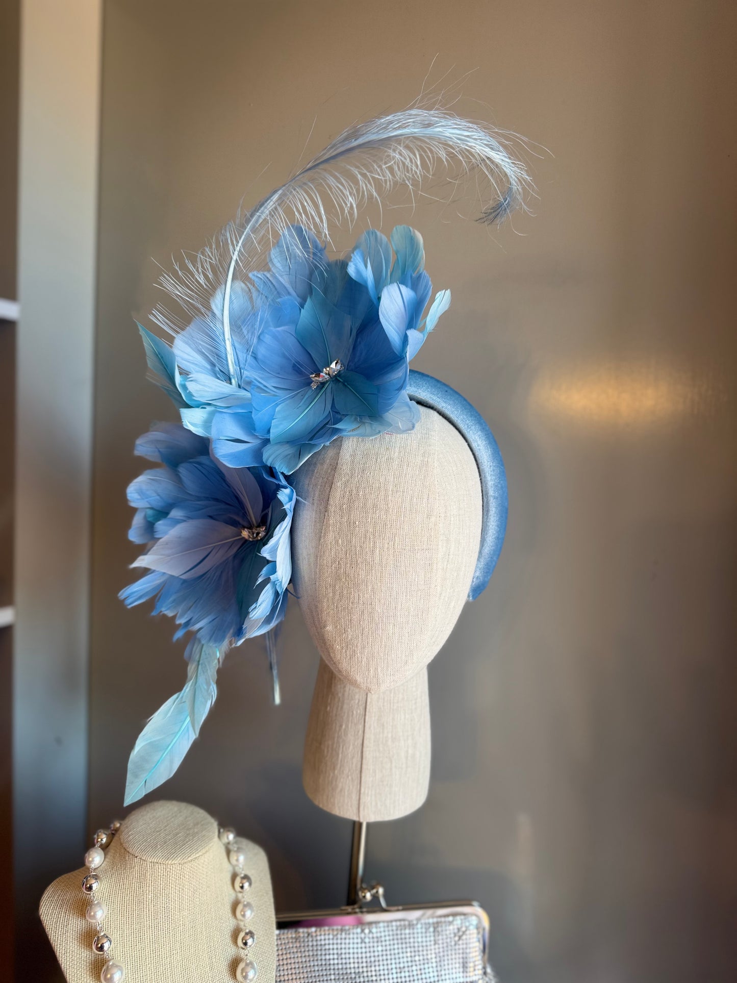 “Gracie” blue feather statement