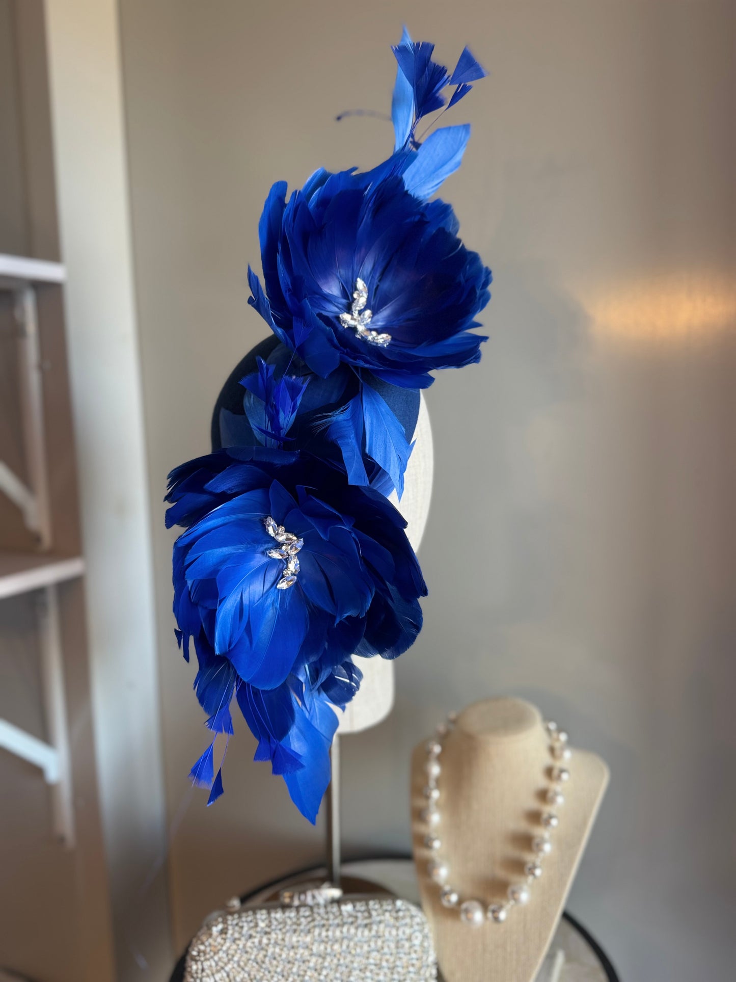 “Diva” blue feather statement felt/wool pillbox