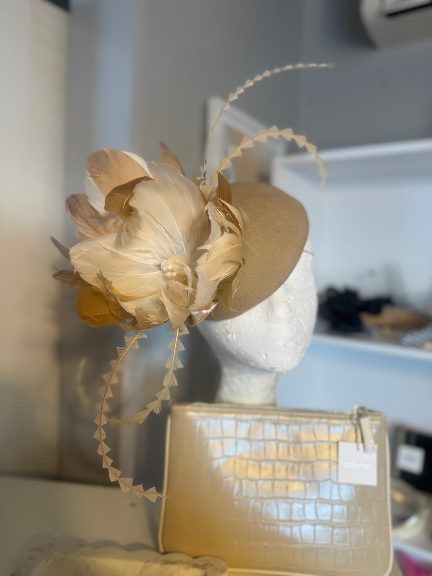 “Clara” nude cream feather felt/wool button
