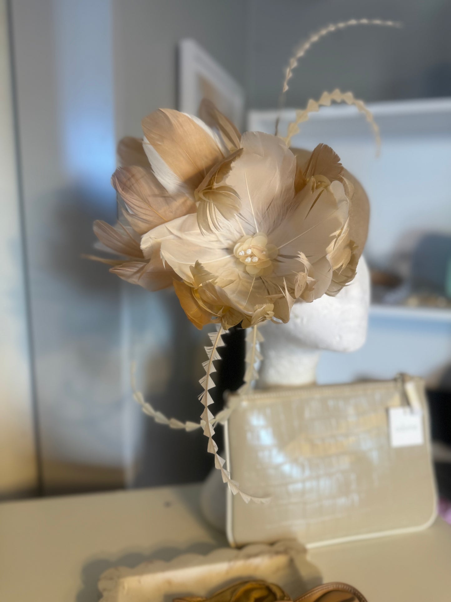 “Clara” nude cream feather felt/wool button