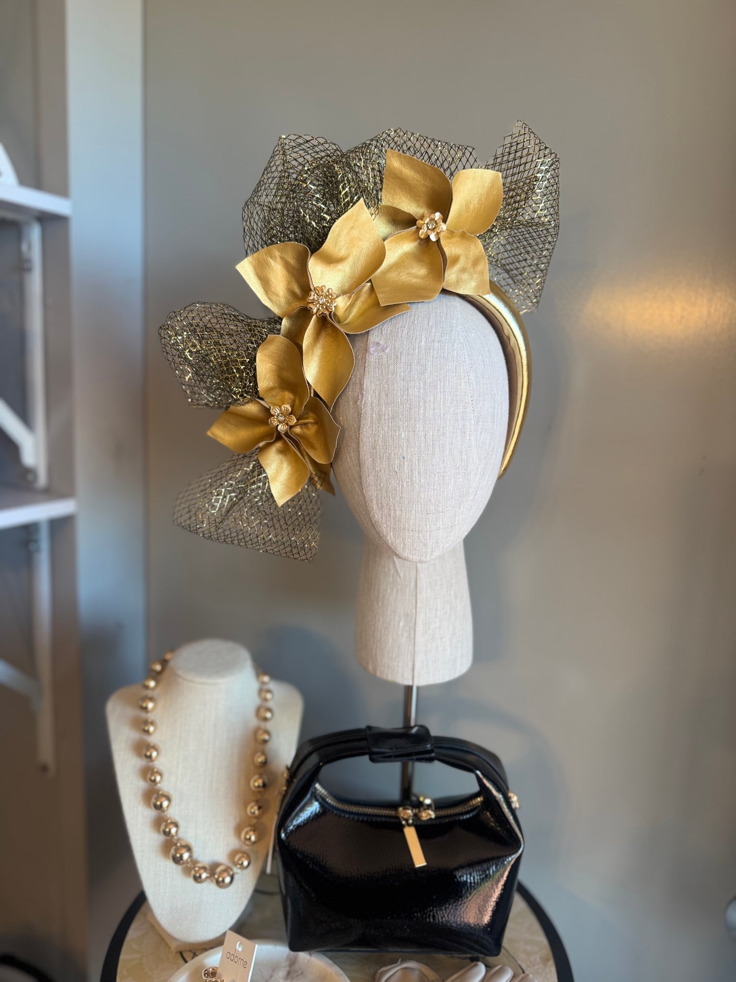 “Louise” gold pleather statement