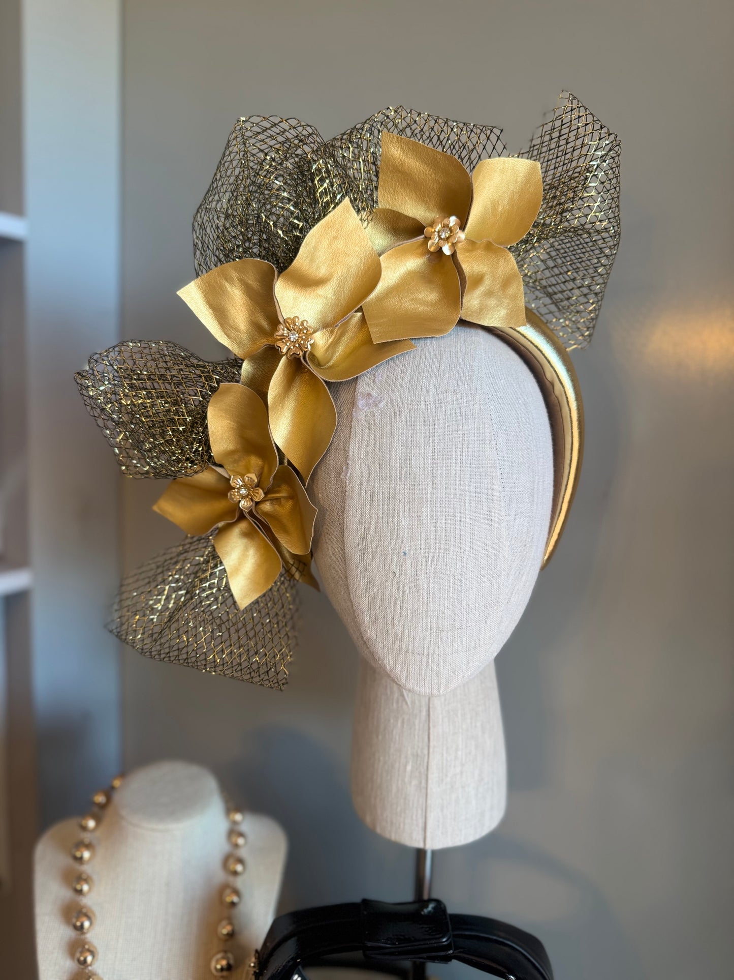 “Louise” gold pleather statement