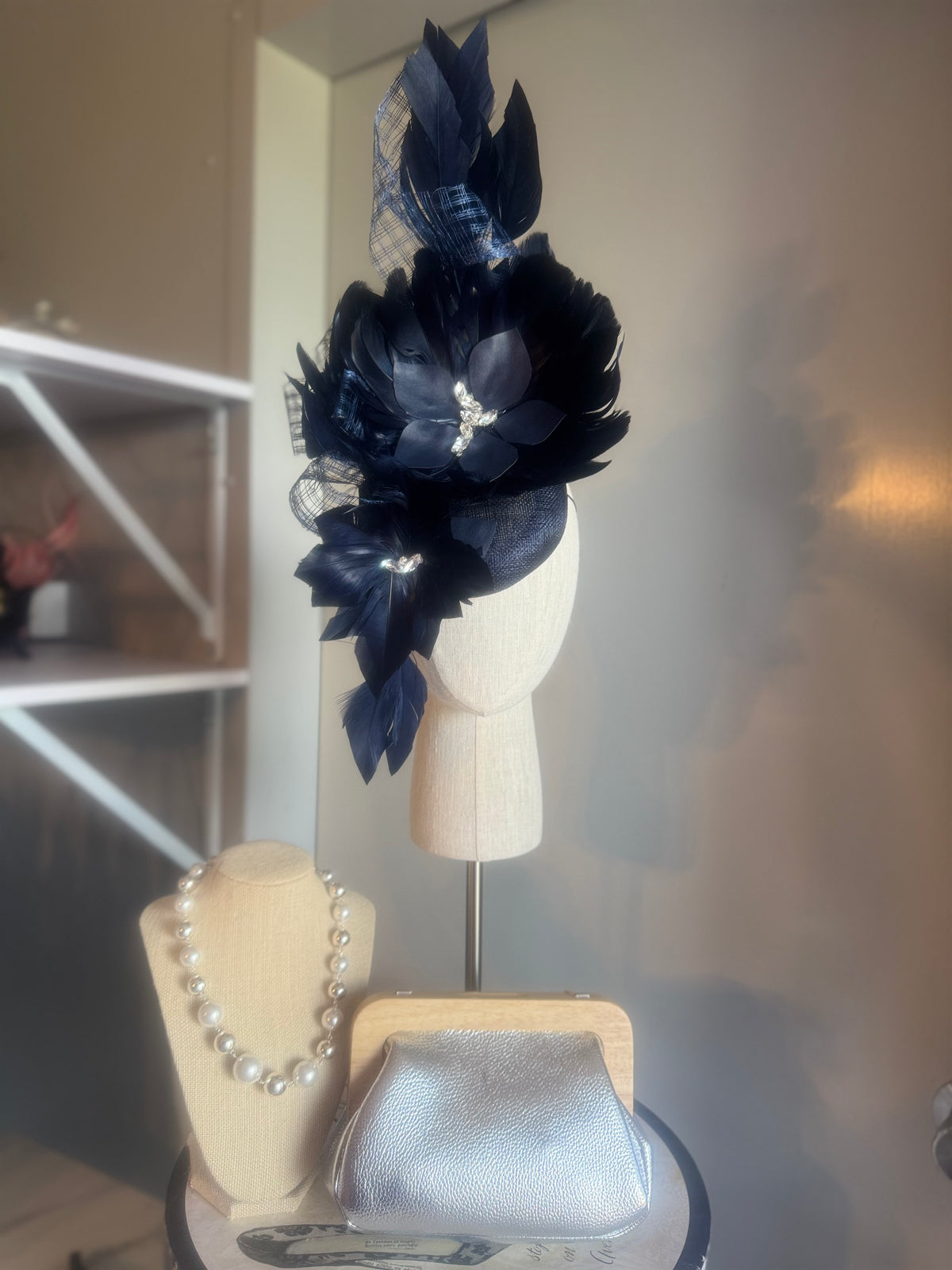 “Maddie” Navy feather statement