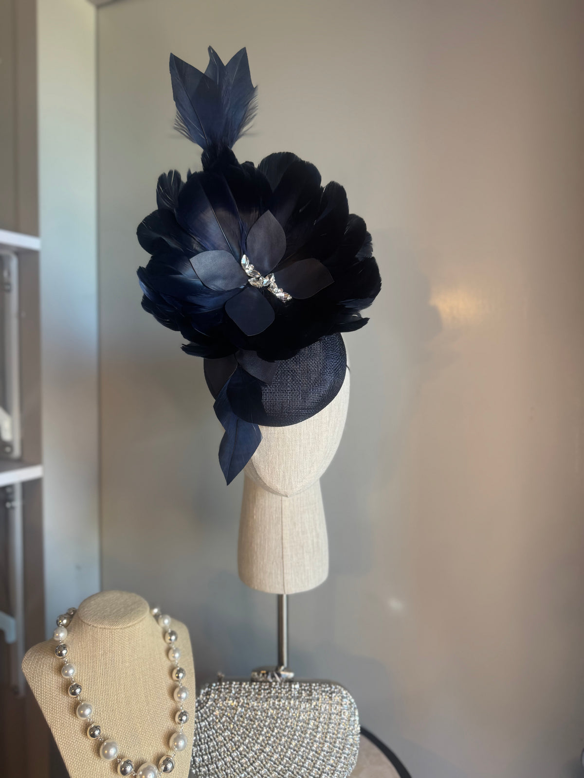 “Alison” Navy feather statement