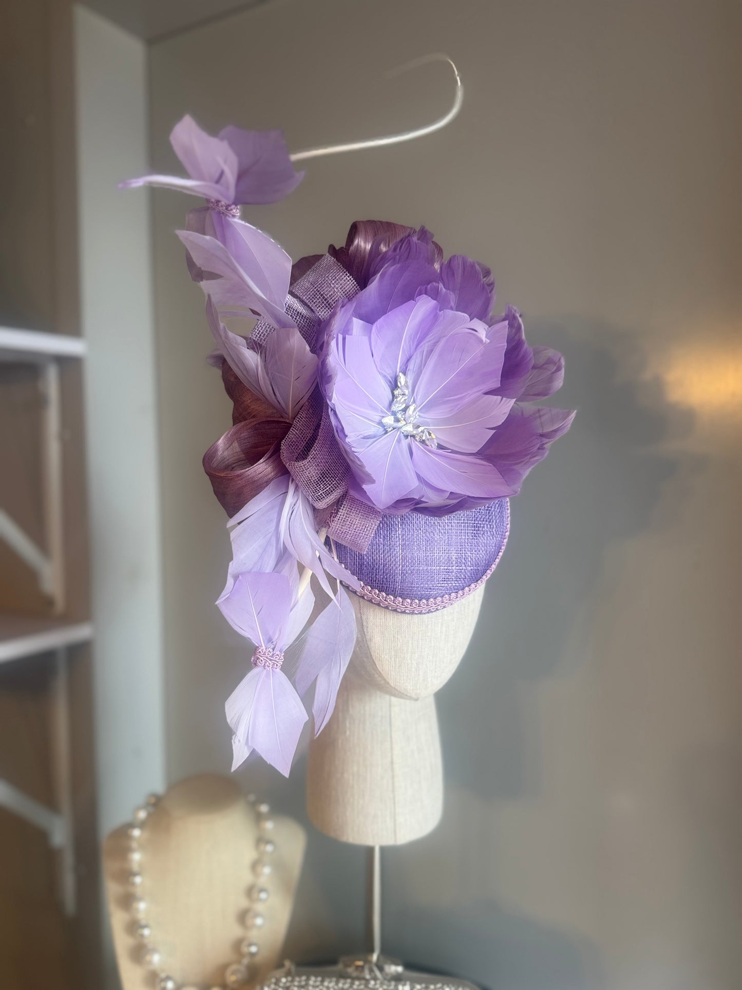 “Westeria” feather statement