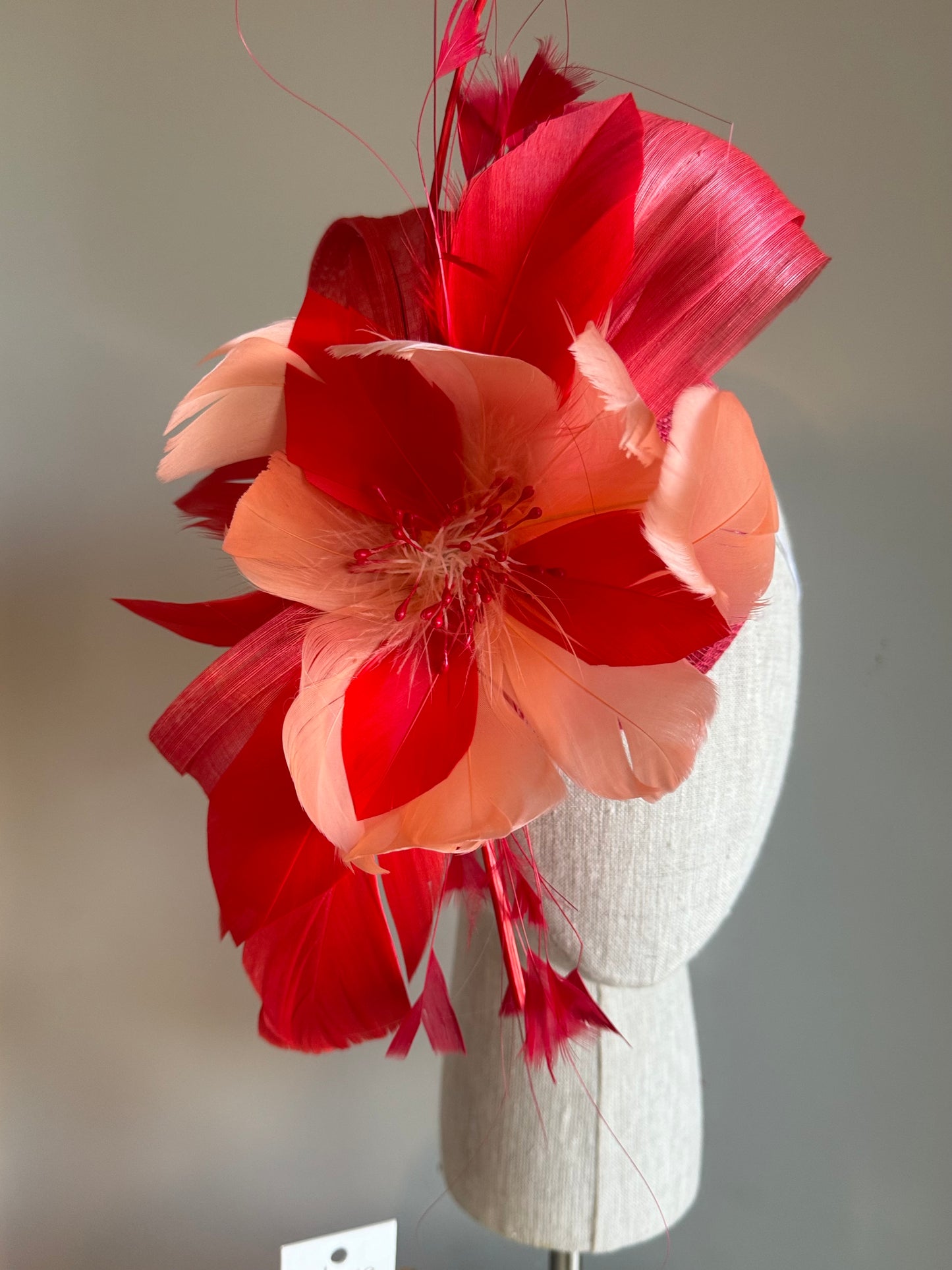 “Sara” coral & red floral fascinator