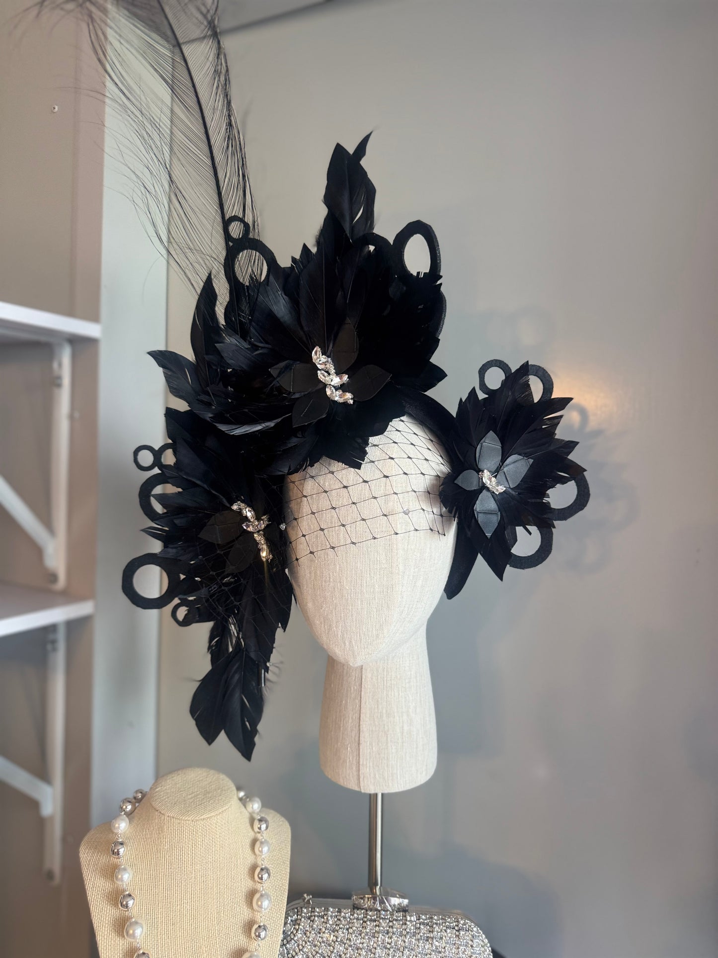 “Odette” Black and silver feather statement