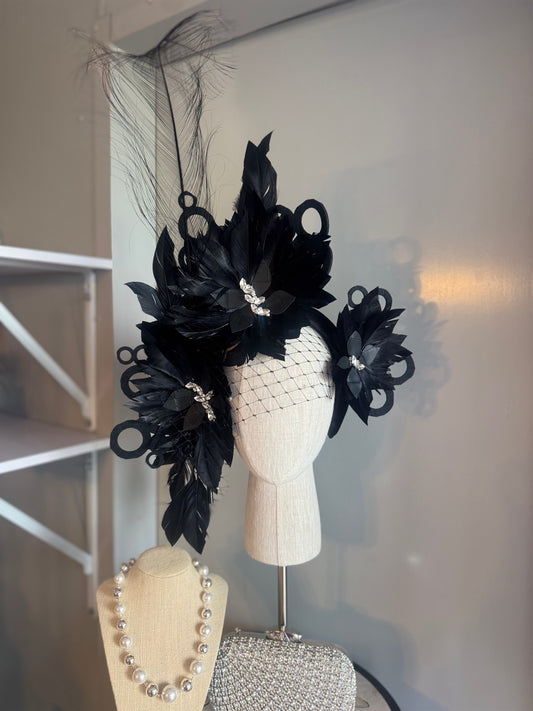 “Odette” Black and silver feather statement