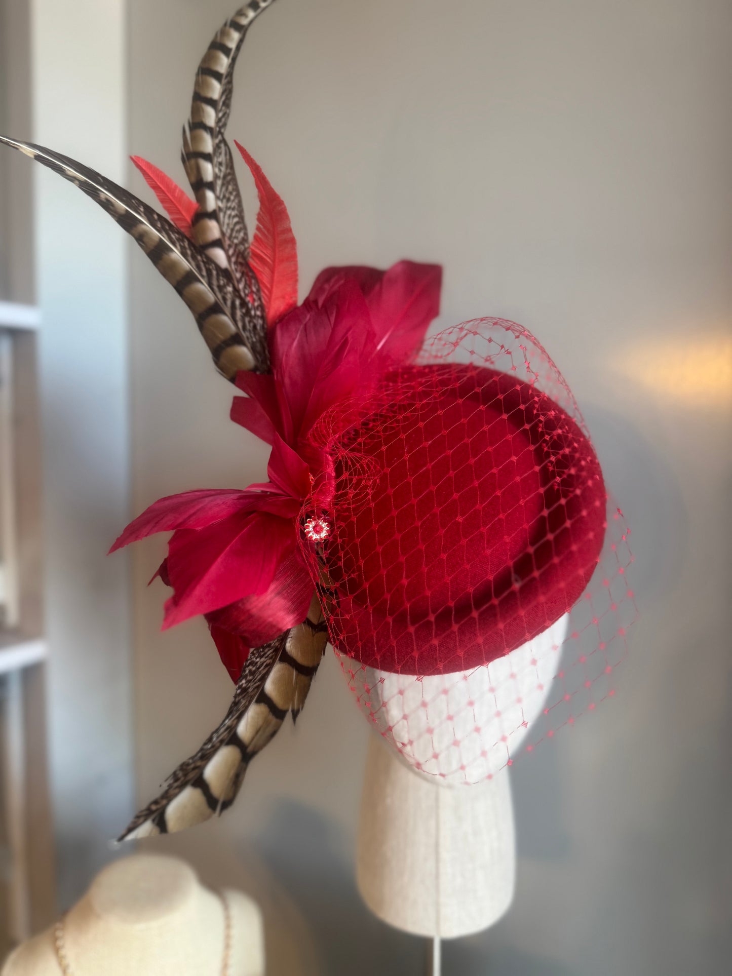 “Jaclyn” red feather statement