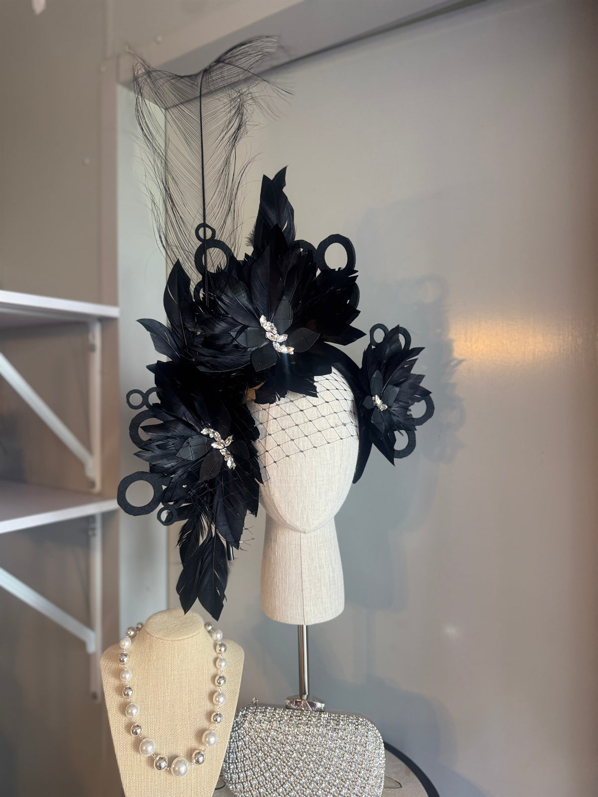 “Odette” Black and silver feather statement