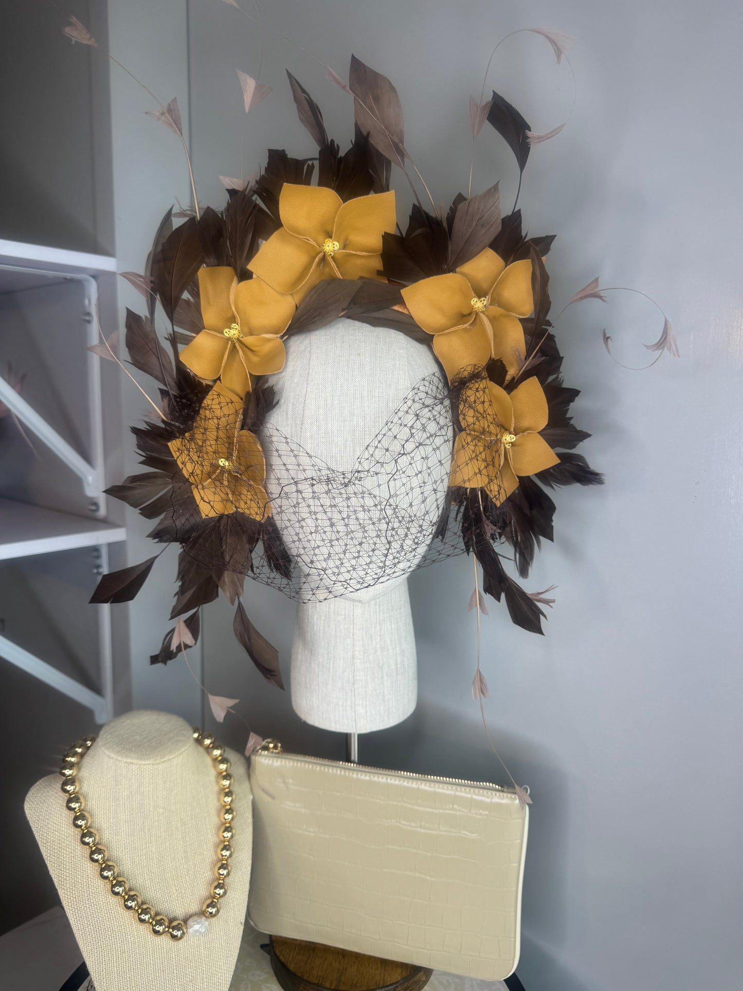 “Pippa” caramel mustard & chocolate leather & feather statement
