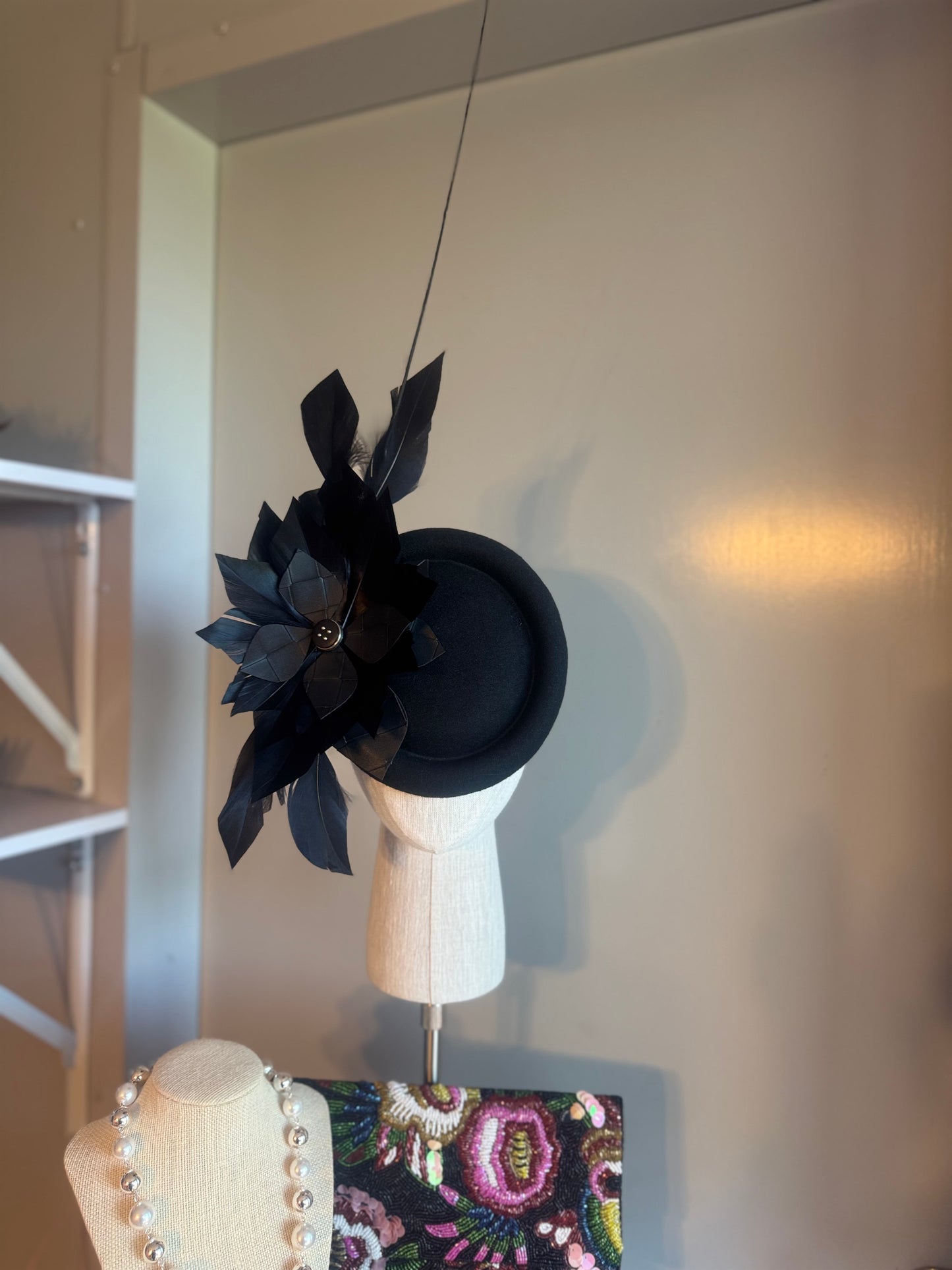 “Toni” black feather statement