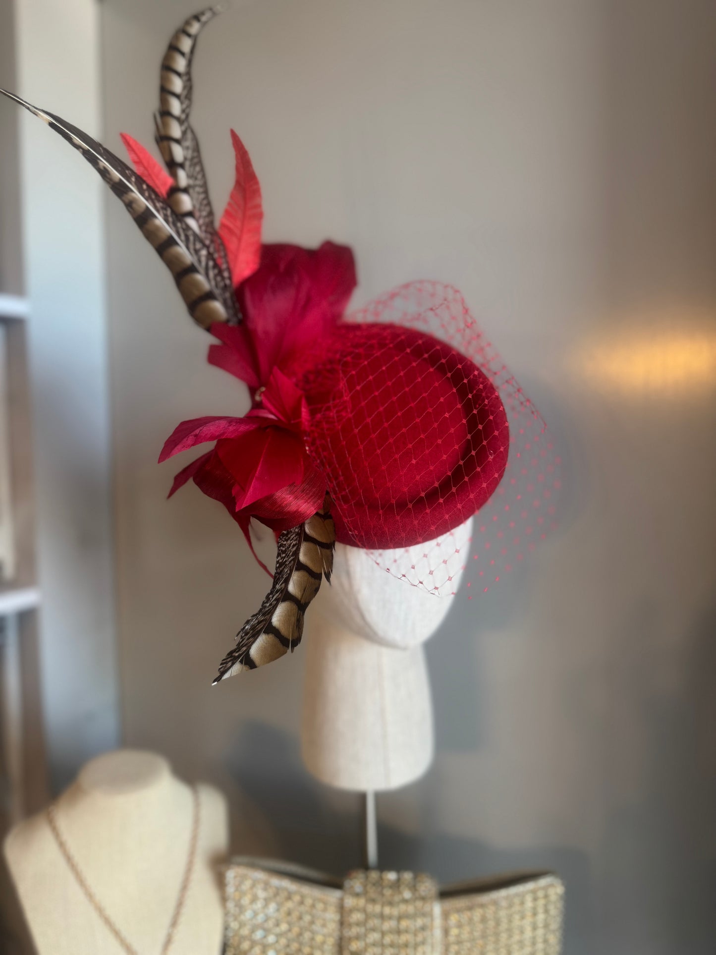 “Jaclyn” red feather statement