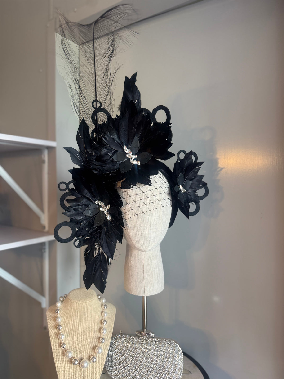 “Odette” Black and silver feather statement