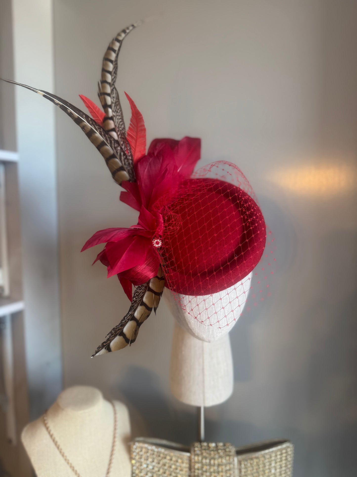 “Jaclyn” red feather statement