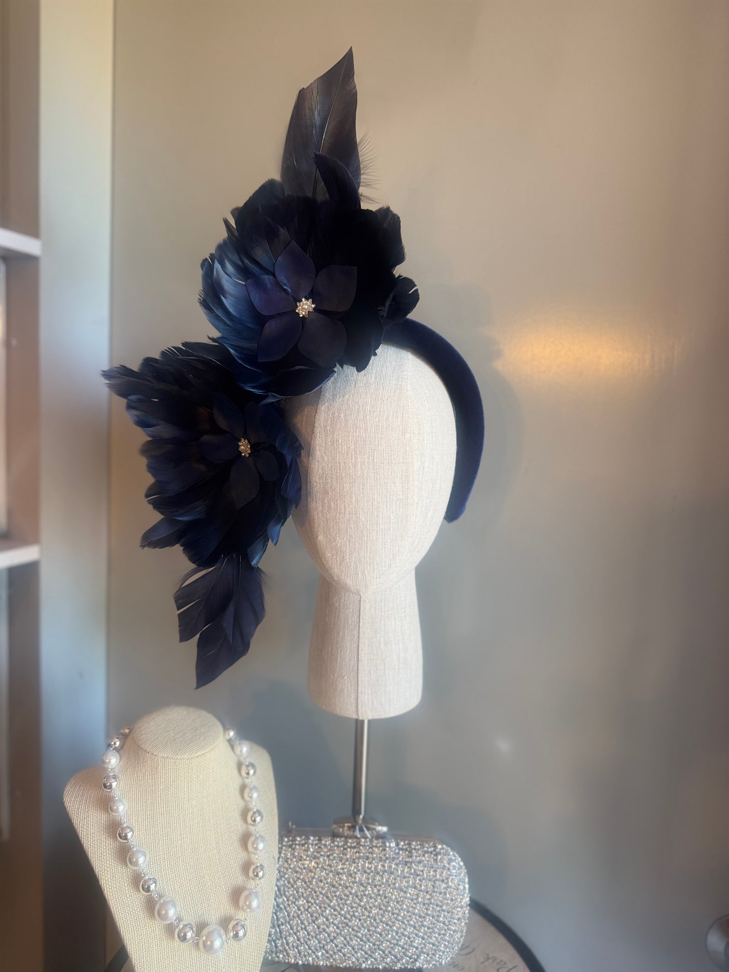 “Maggie” Navy feather statement