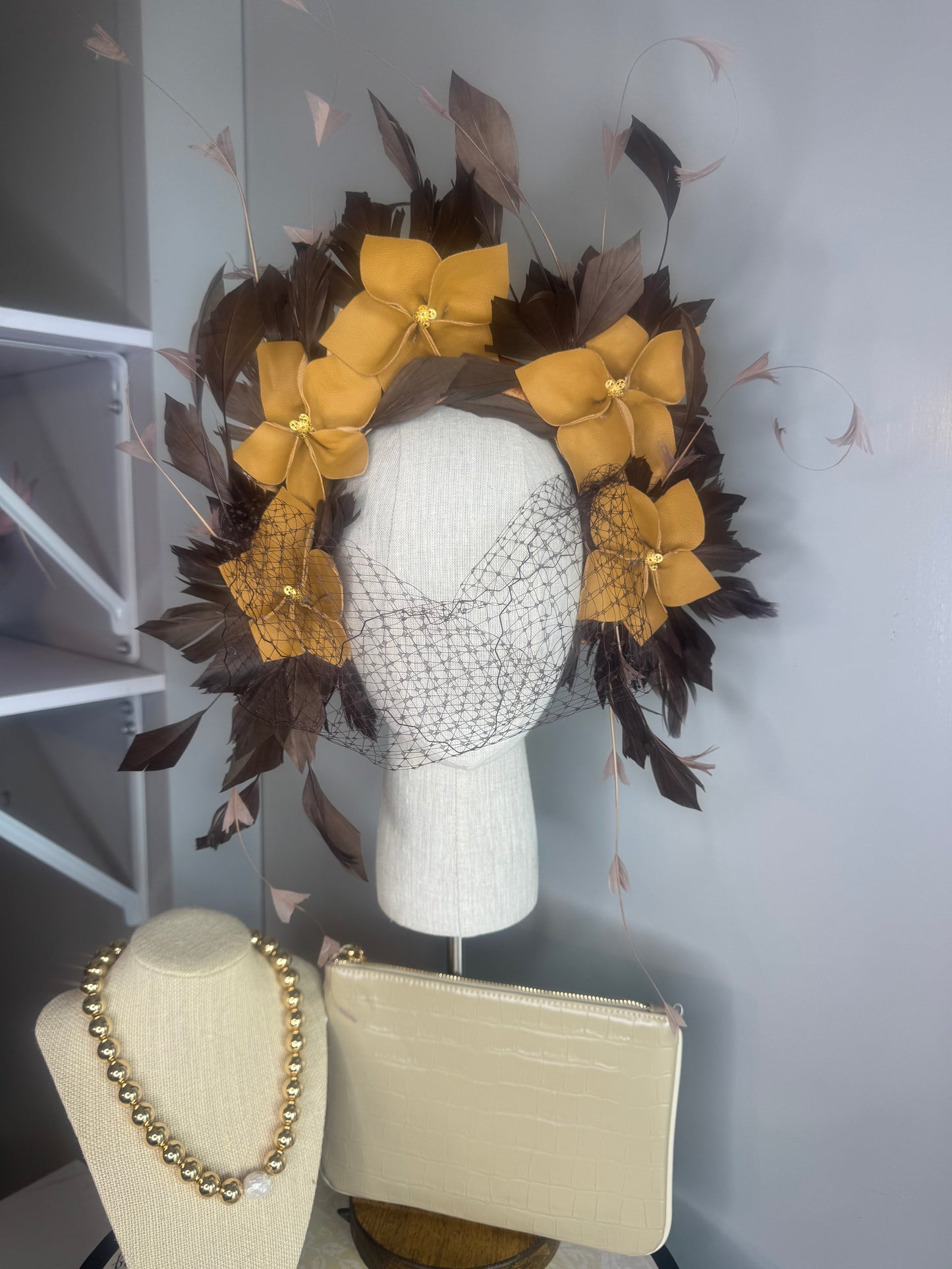 “Pippa” caramel mustard & chocolate leather & feather statement