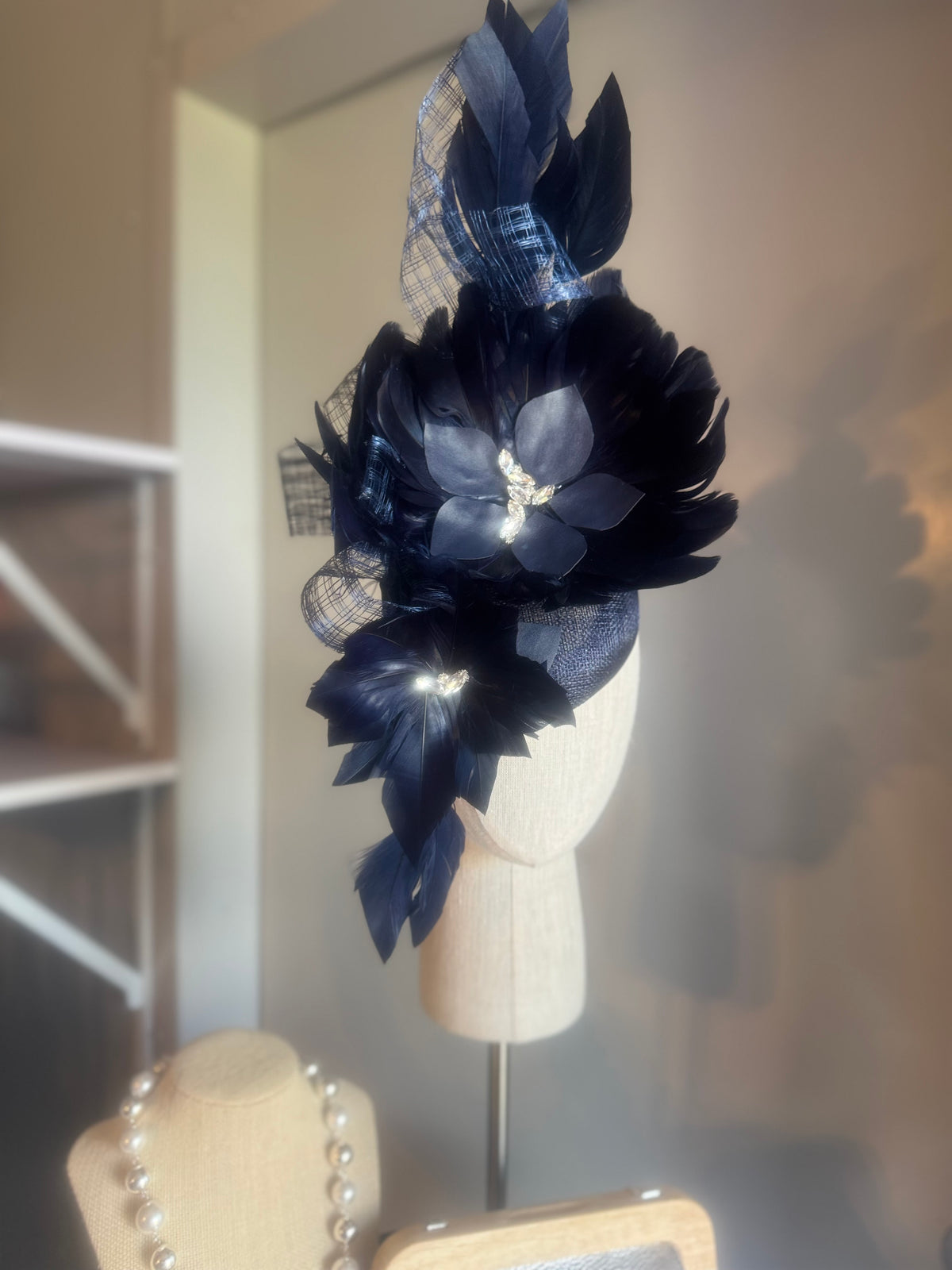 “Maddie” Navy feather statement