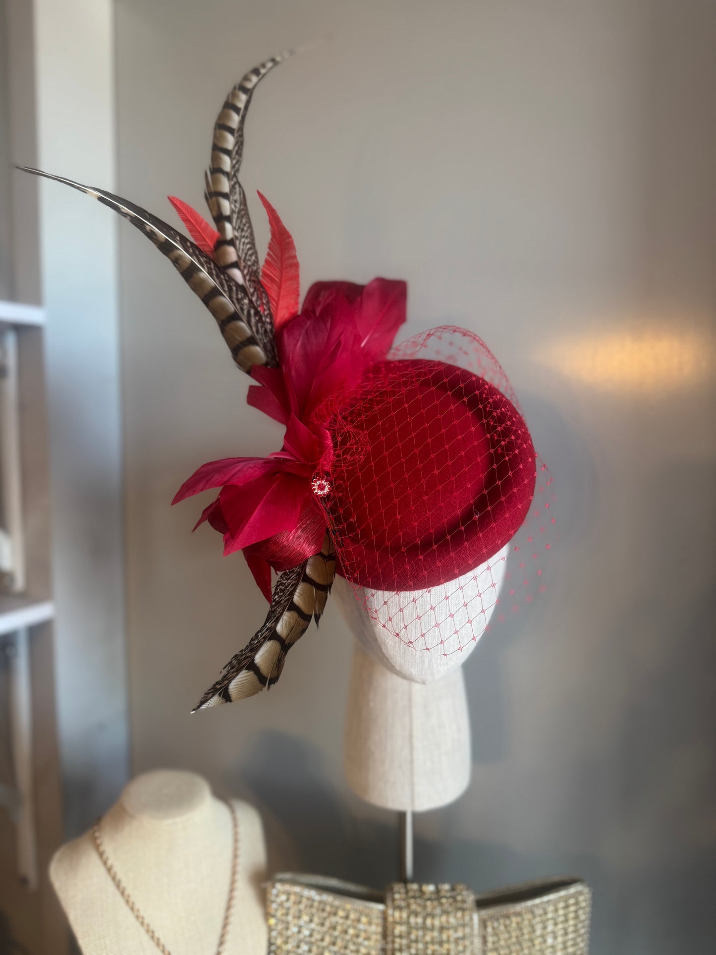 “Jaclyn” red feather statement