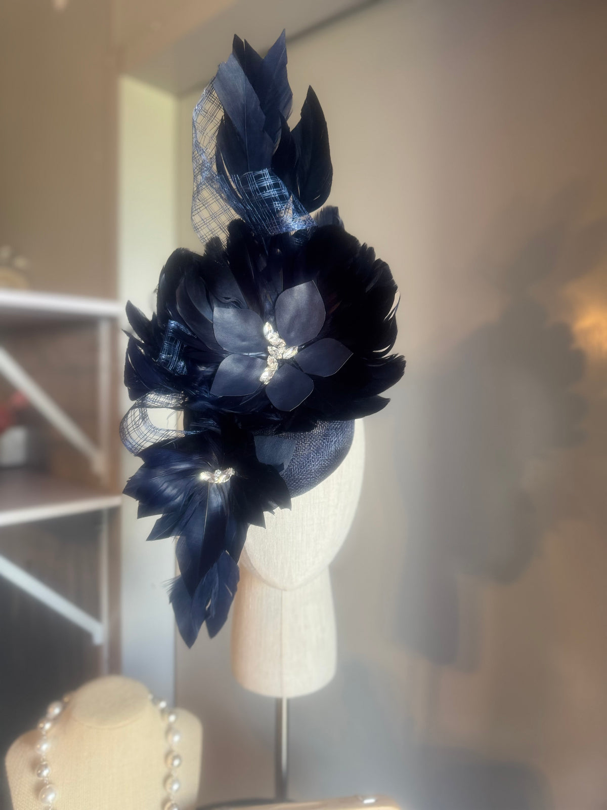 “Maddie” Navy feather statement