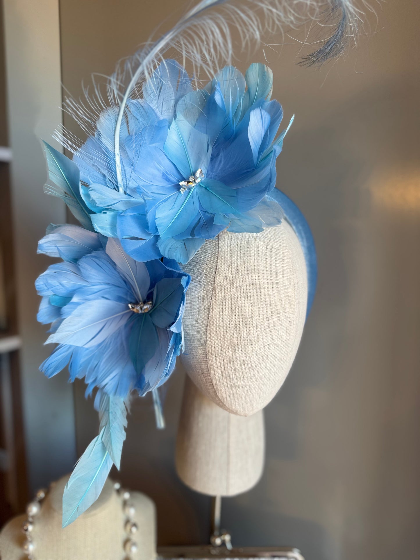 “Gracie” blue feather statement