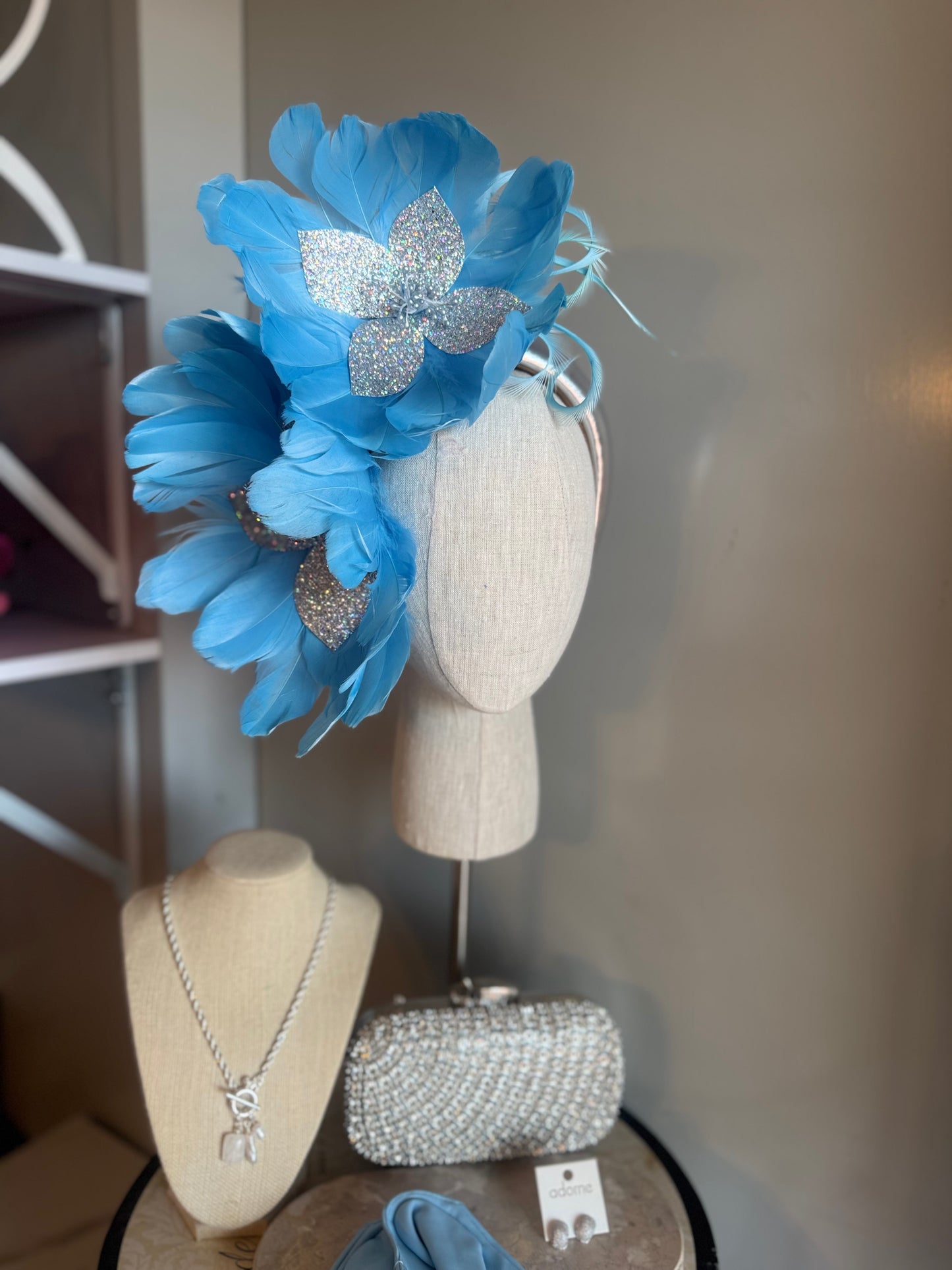 “Jeanada” baby blue & silver feather statement