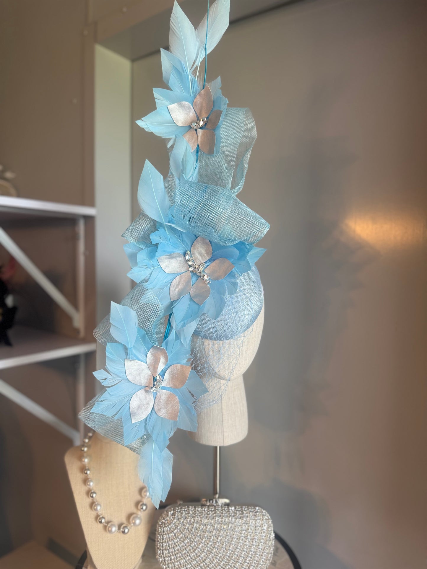 “Claudia” blue silver feather statement