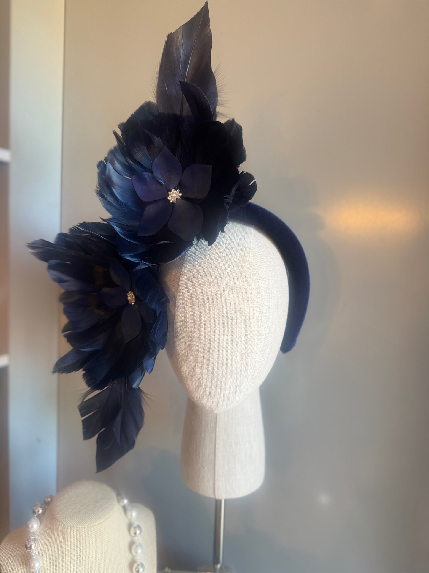 “Maggie” Navy feather statement