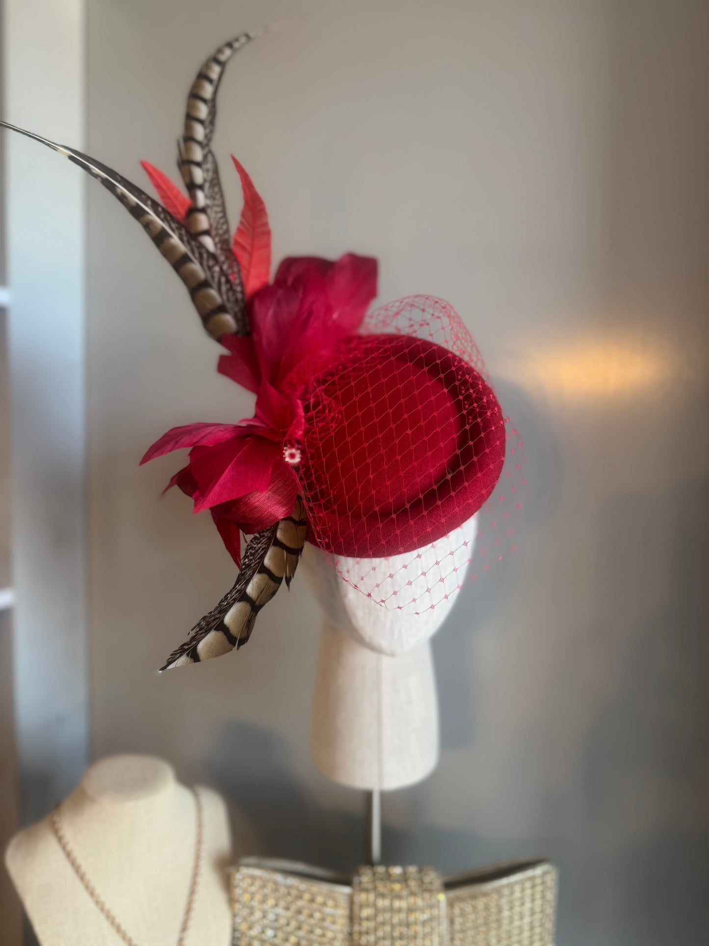 “Jaclyn” red feather statement