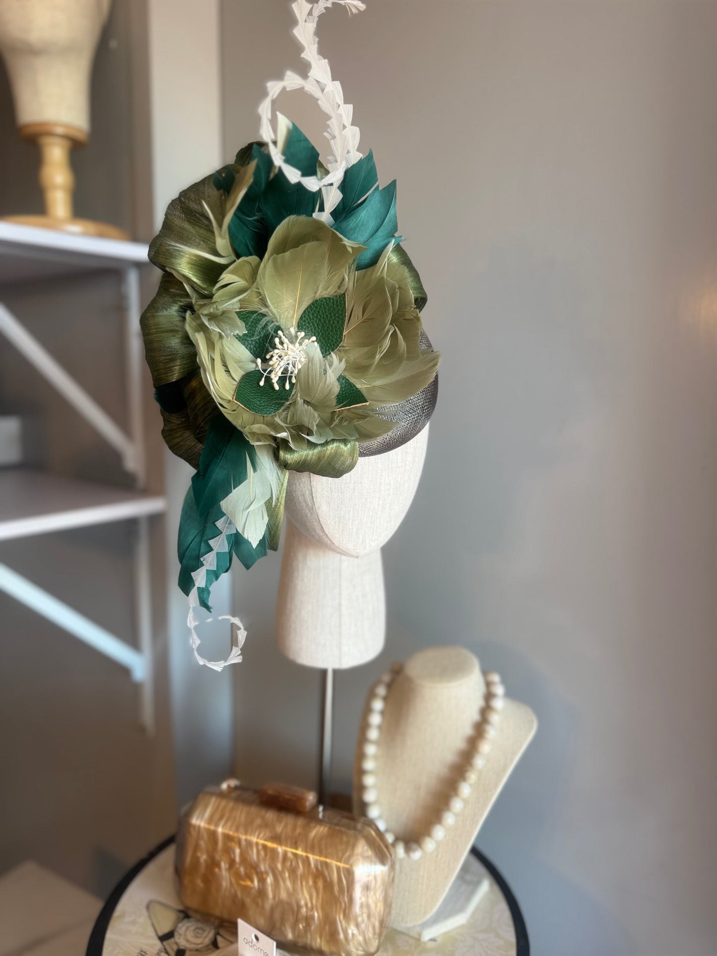 “August” green feather statement