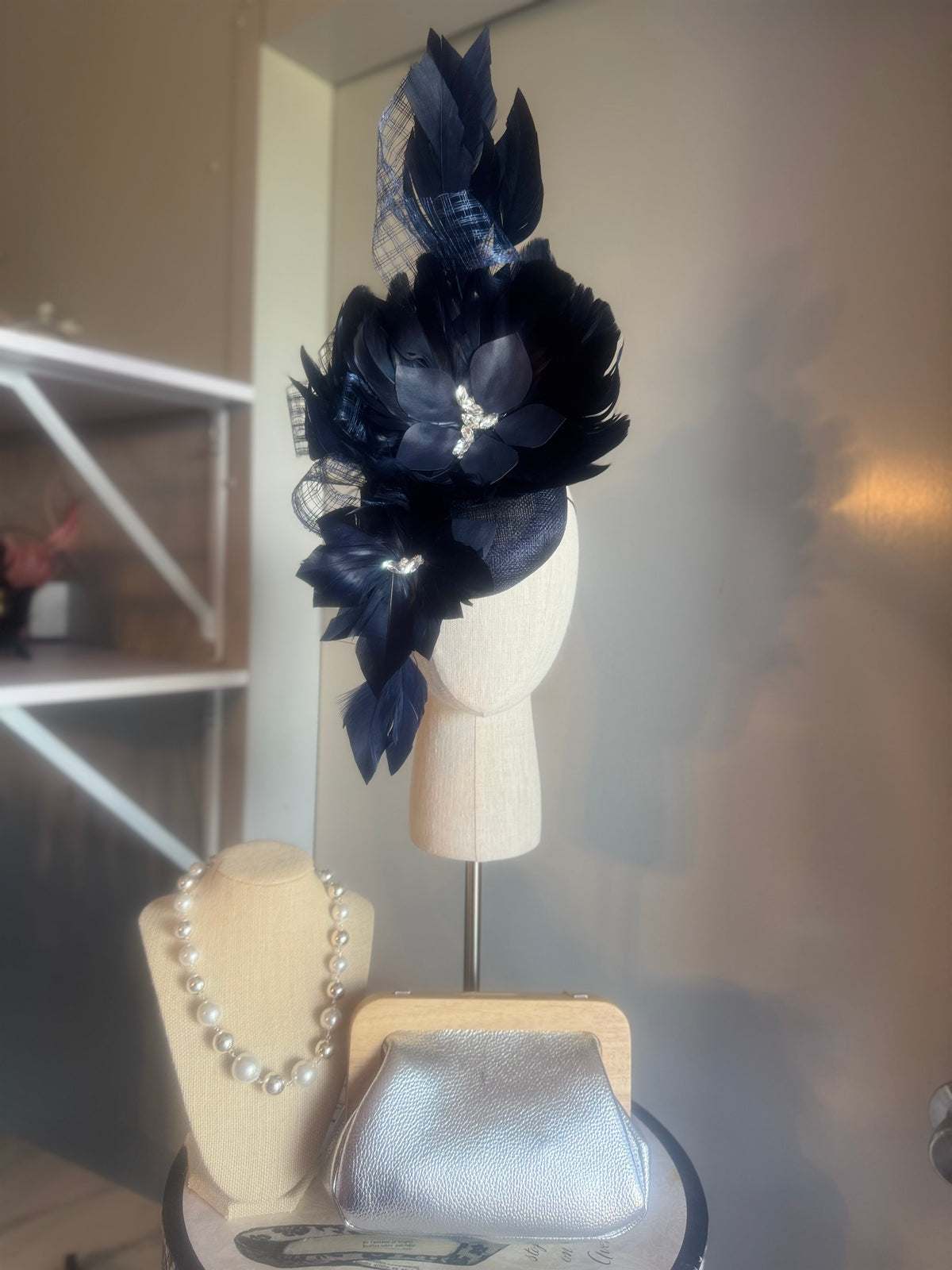 “Maddie” Navy feather statement