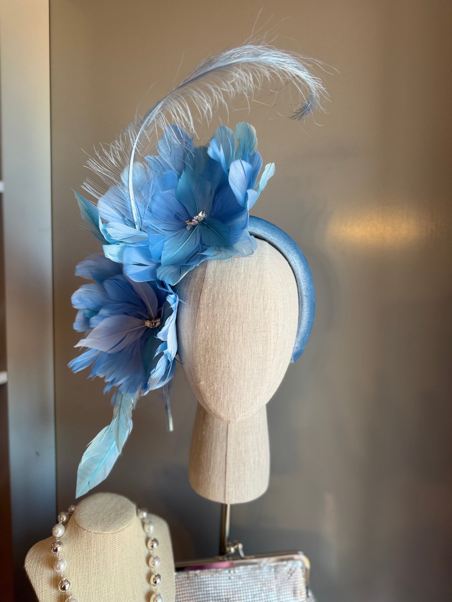 “Gracie” blue feather statement