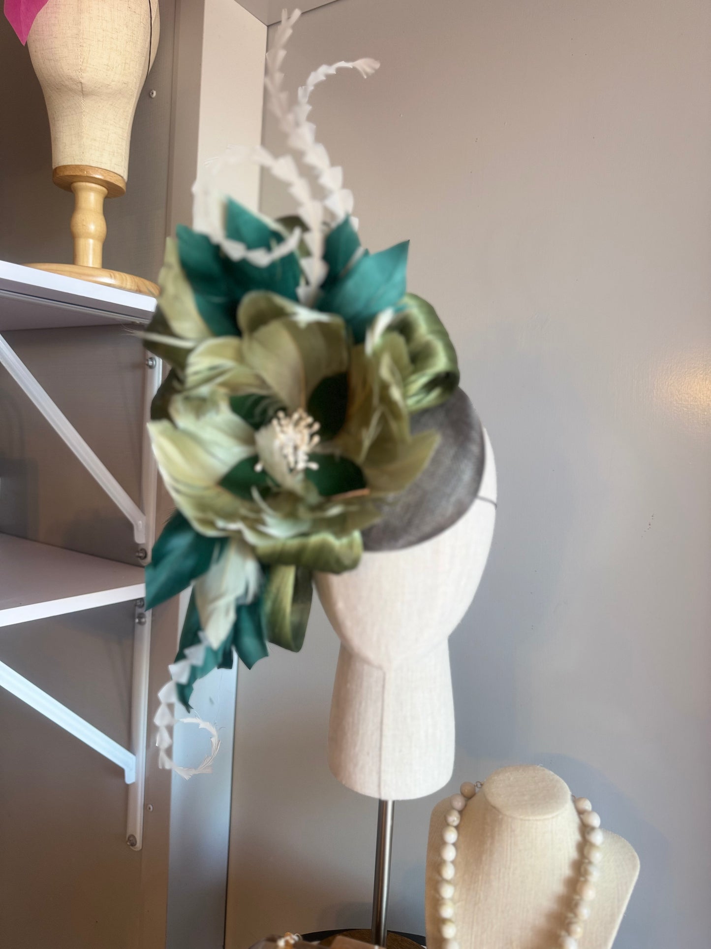 “August” green feather statement