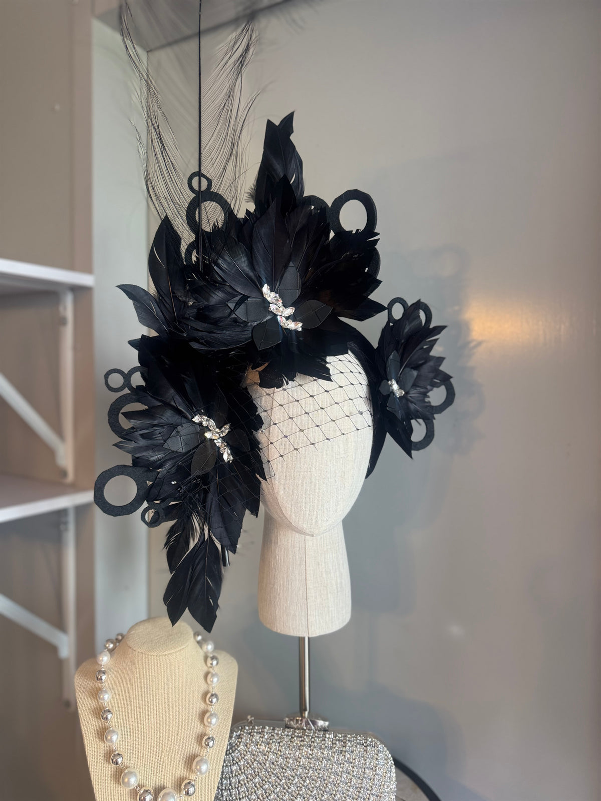 “Odette” Black and silver feather statement