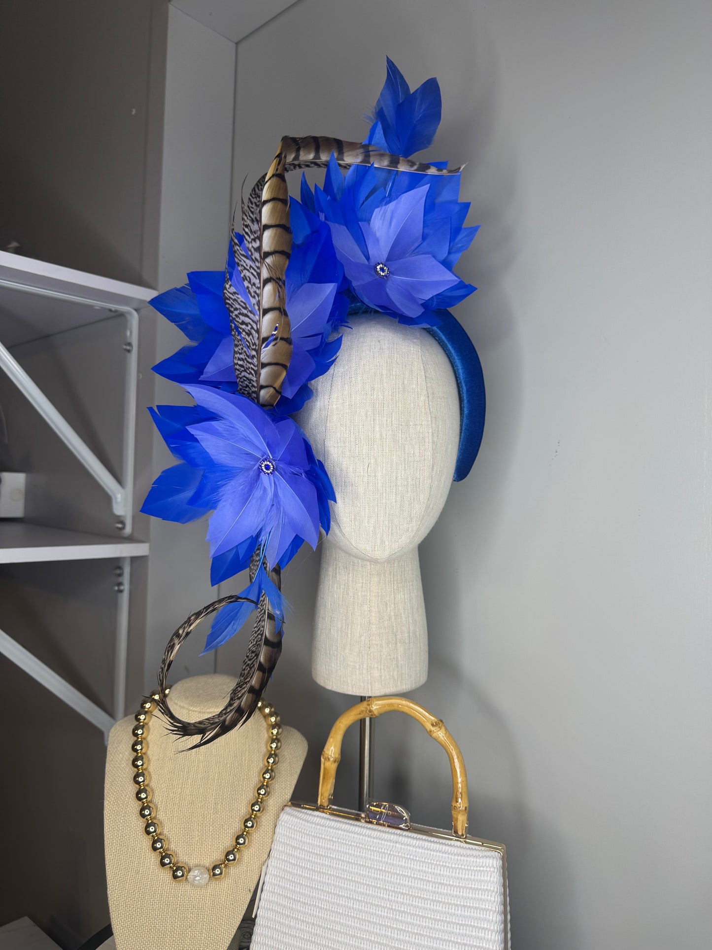 “Lola” blue feather statement