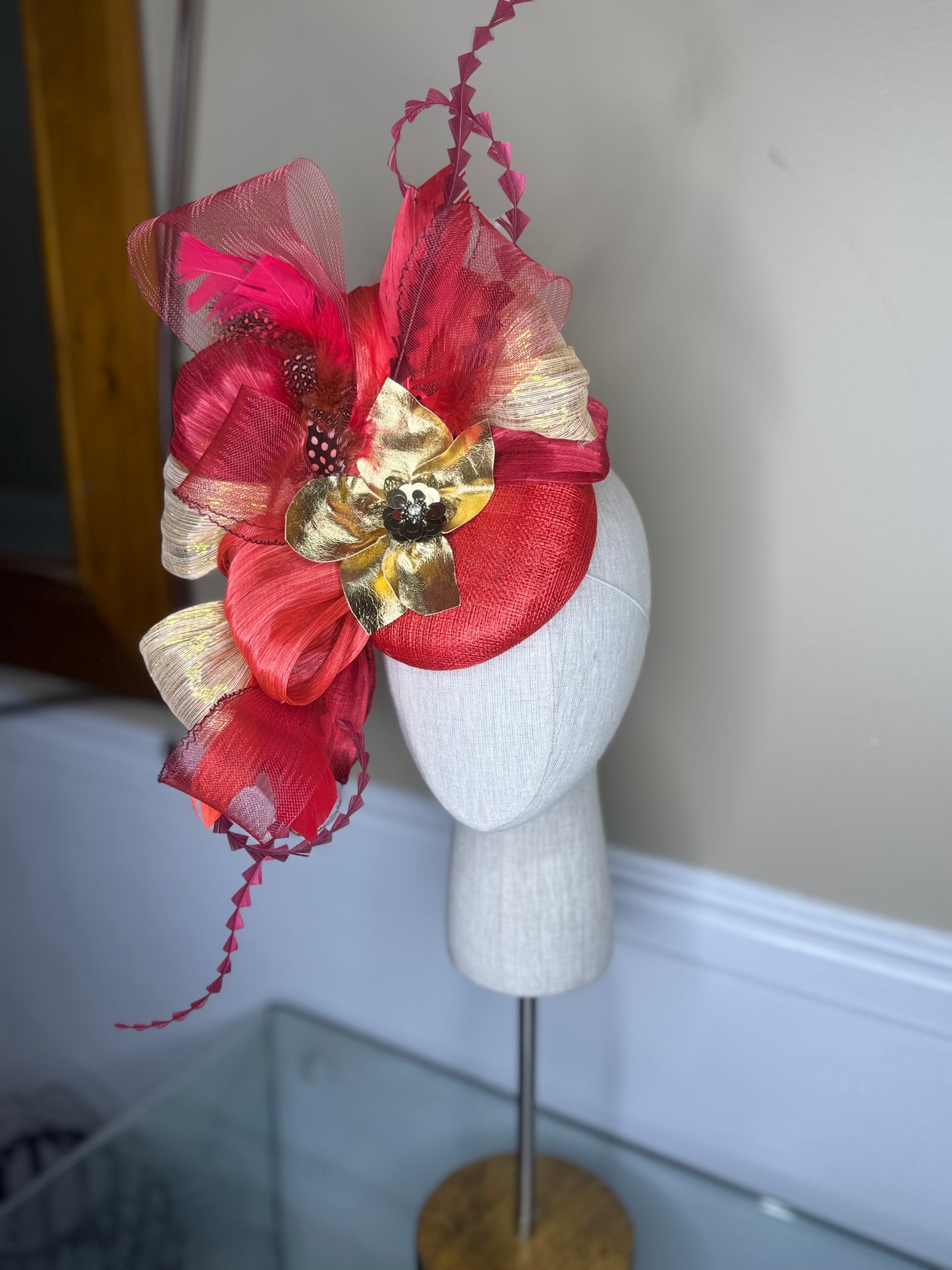 “Lucia” shades of red & gold statement fascinator