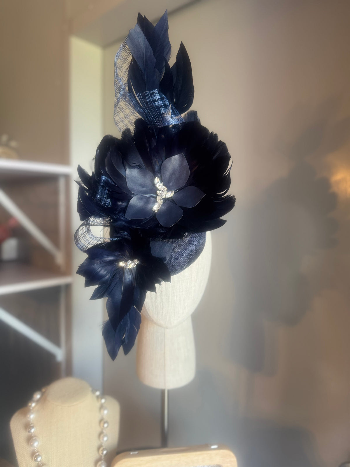 “Maddie” Navy feather statement