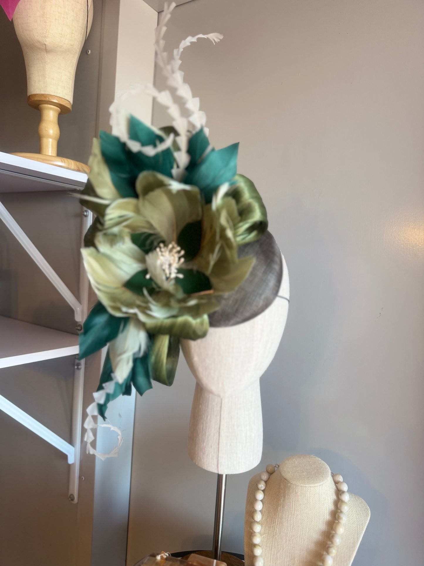 “August” green feather statement
