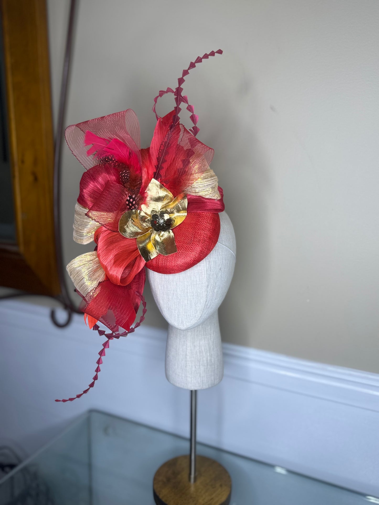 “Lucia” shades of red & gold statement fascinator