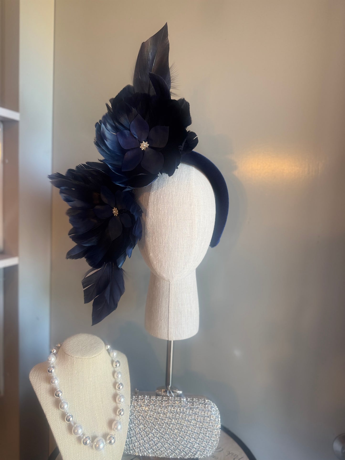 “Maggie” Navy feather statement