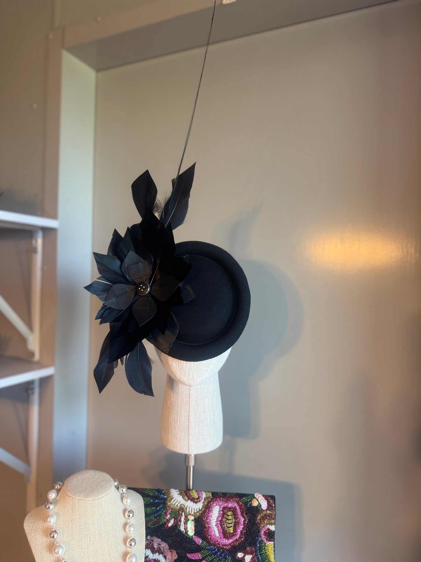 “Toni” black feather statement