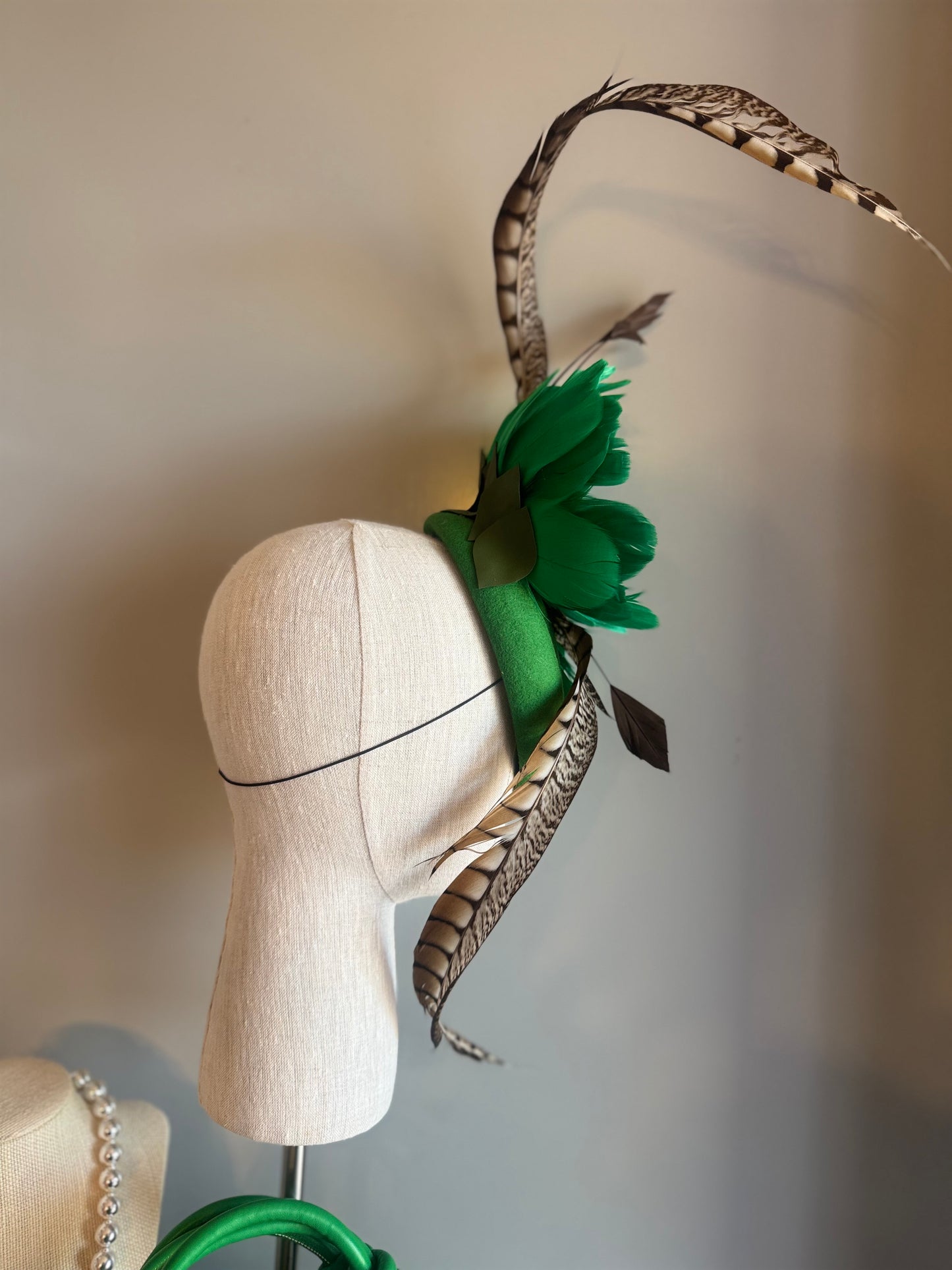 “Sim” Green feather statement pillbox